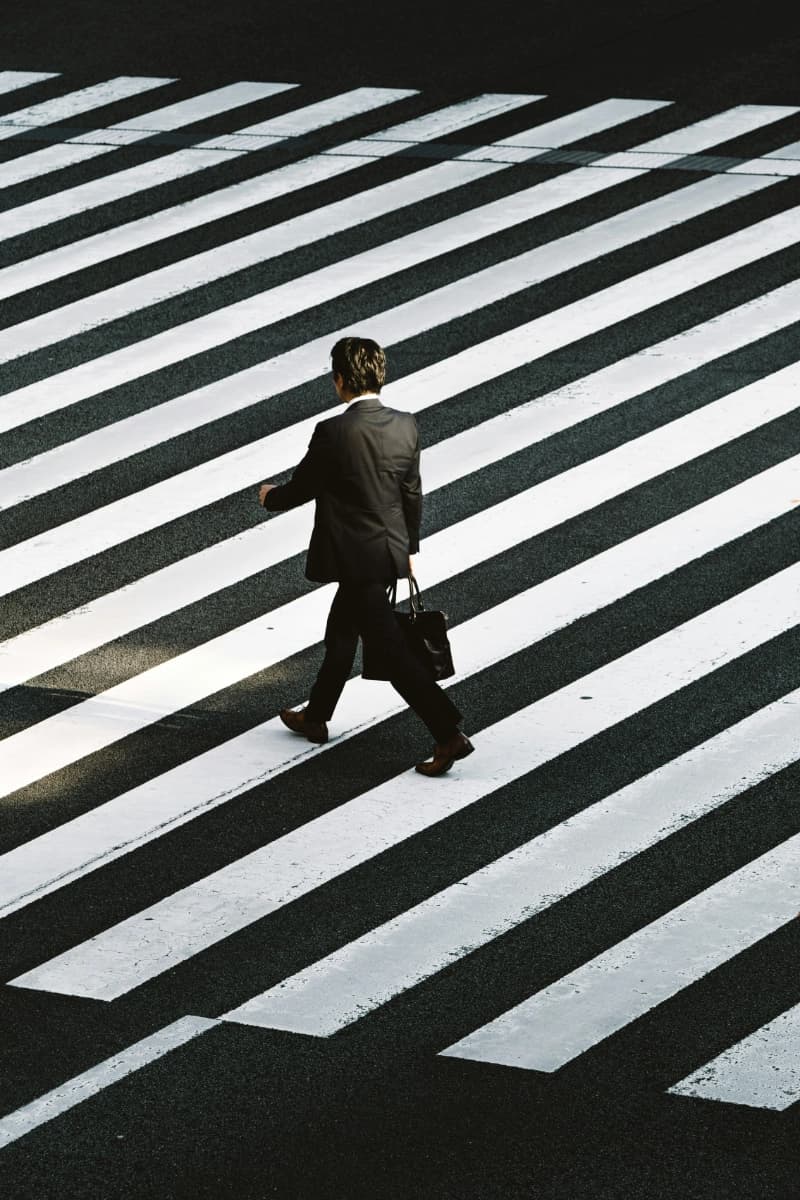 guy walking with breifcase